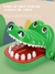 Jogo dos brinquedos dos dentes do crocodilo para crianças