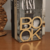 Aparador de livros Book- Dourado - comprar online