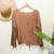 Blusa Marrom na internet