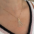 Colar Nossa Senhora Cravejada de Zircônia baanhada em ouro 18k na internet