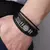 Pulseira de Couro Trançado Multicamadas com Detalhes de Escrituras, Bússola e Olho Grego - comprar online