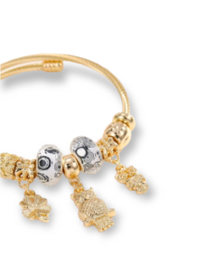 PULSERA CON DISEÑO DE BUHO Y TRÉBOL - comprar online