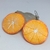 Brincos de laranjas