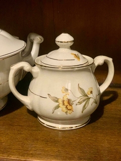 Azucarera con flor amarilla