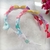 Tiara mini laços