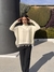 Sweater con flecos en internet