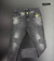 CALÇA JEANS - CINZA RASGADA