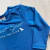 Conjunto camiseta e sunga em malha FPS 50 Quimby - loja online