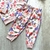 Conjunto jaqueta com capuz e calça em moletom