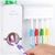 Dispensador de aplicador de pasta de dente e porta-escovas para uso no banheiro - comprar online