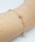 Pulseira de bolas com brilho