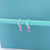Argola com pingente retangular rosa