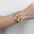 Pulseira Eclipse c/ pérolas dourada na internet