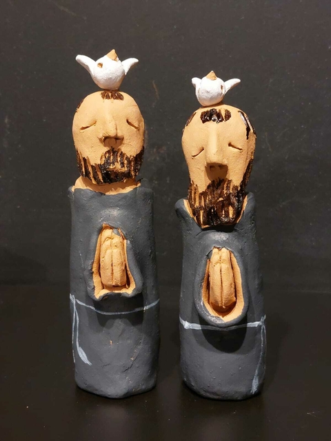 Mini São Francisco orando