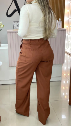 CALÇA TIANE na internet