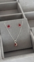 Conjunto zircônia vermelha