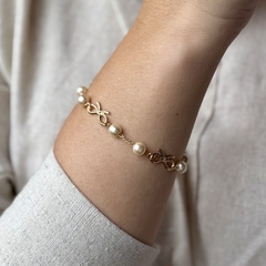 Pulseira Laço Pérolas banhada a ouro 18k - comprar online