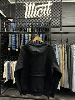 Hoddie CMMNTY negro letras en internet