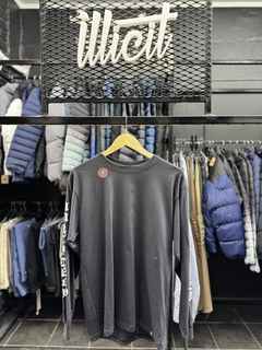 REMERA MANGA LARGA GRIS CMMNTY