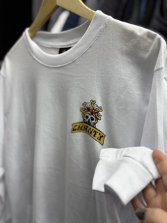 REMERA MANGA LARGA BLANCA DIBUJO ESPALDA - comprar online