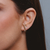 Brinco ear hook zircônias X dourado - comprar online