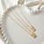 Colar escapulário retangular dourado - comprar online