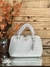 Bolsa Prada