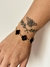 Pulseira Van Cleff Preta e Dourada na internet