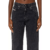 Calça feminina Diesel 2016 D-Air, de lavagem escura, vista da frente com foco na cintura e nas mãos segurando a calça.