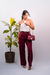 Calça pantalona com fivela dourada