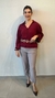 Calça cenoura com detalhes de botões - comprar online