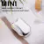 Mini barbeador elétrico para homens, aparador de barba portátil.