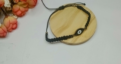 PULSERA HILO + DIJE OJO - comprar online