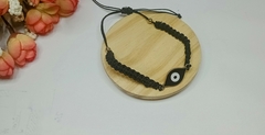PULSERA HILO + DIJE OJO