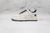 Undefeated x Air Force 1 “White Blue” na internet