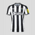 Camisa-Newcastle-I-23_24-Torcedor-Castore-Masculina-Branco-e-Preto-preta-branca-masculino-1-bruno-guimarães-Joelinton-original-comprar-premier-league-listra-listrada-listras-sela-Magpies-gola-v