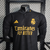 Camisa-Real-Madrid-III-2324-jogador-Adidas-Masculina-Preta-preto-3-bellingam-belingan-Jude-Bellingham-vinicius-junior-vini-jr-merengue-madri-dourada-dourado-emirates-fly-better-masculino-original-comprar