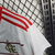 Camisa-2-CR-Flamengo-23-24-Feminina-away-ii-Branco-e-dourada-branca-dourado-vermelho-vermelha-listra-listras-listrada-camiseta-mengão-torcedor-2023-2024-gabigol-arrascaeta-feminino-preto-preta