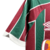 camisa-fluminense-i-23-24-torcedor-umbro-masculina-verde-grena-e-branco-2023-2024-masculino-branca-listrada-tricolor-gola-v-flu-fluzão-1-german-cano-l-diniz-dinizismo-carioca-marcelo-felipe-melo-campeão-libertadores-camiseta-camisola-blusa
