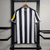 Camisa-Newcastle-I-23_24-Torcedor-Castore-Masculina-Branco-e-Preto-preta-branca-masculino-1-bruno-guimarães-Joelinton-original-comprar-premier-league-listra-listrada-listras-sela-Magpies-gola-v