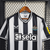 Camisa-Newcastle-I-23_24-Torcedor-Castore-Masculina-Branco-e-Preto-preta-branca-masculino-1-bruno-guimarães-Joelinton-original-comprar-premier-league-listra-listrada-listras-sela-Magpies-gola-v