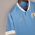 camisa-selecao-do-uruguai-home-22-23-torcedor-puma-masculina-azul-celeste-2022-2023-soares-cavani-masculino-1-i-original-gola-polo-branca-branco-lisa-copa-do-mundo-catar-qatar-valverde-arrascaeta-uruguaia
