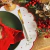 Mantel individual bordado de lunares navideños en internet
