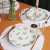 Plato Llano de Porcelana Conchas y Estrellas Oro y Plata