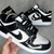 Dunk Low Preto Brilhante e branco - comprar online