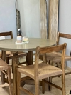 Mesa comedor redonda petiribi y microcemento