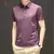 Polo de seda de camello bordado de alta gama