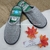 IKKI PANTUFLA HOMBRE GRIS CLARO CON VERDE 211GC