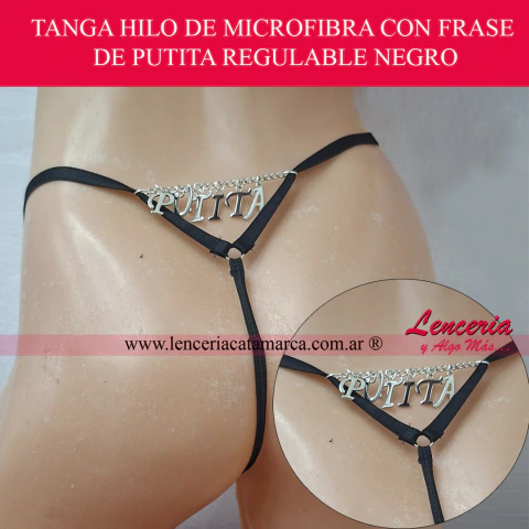 Tanga hilo dental de microfibra color negro para mujer. Diseño erótico regulable con detalle de cadena y letras metálicas formando la frase provocativa "PUTITA" en la parte trasera.