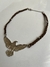 Collar Ave (marrón) en internet